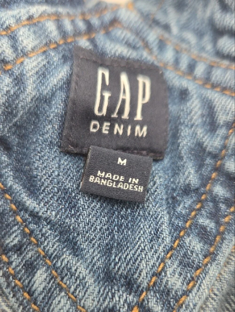 GAP denim garment in classic blue with contrast stitching